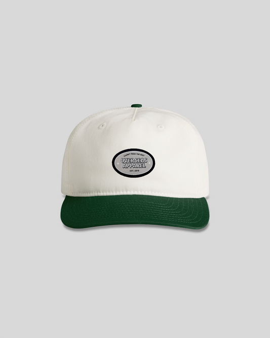 Origins Cream/Green cap